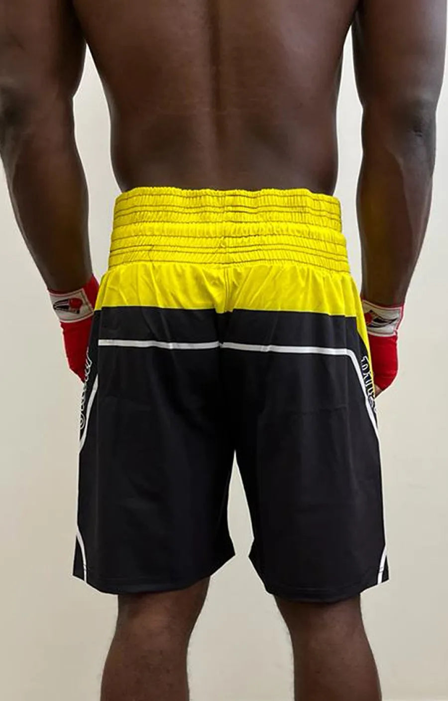 Short jaune et noir Pugistar